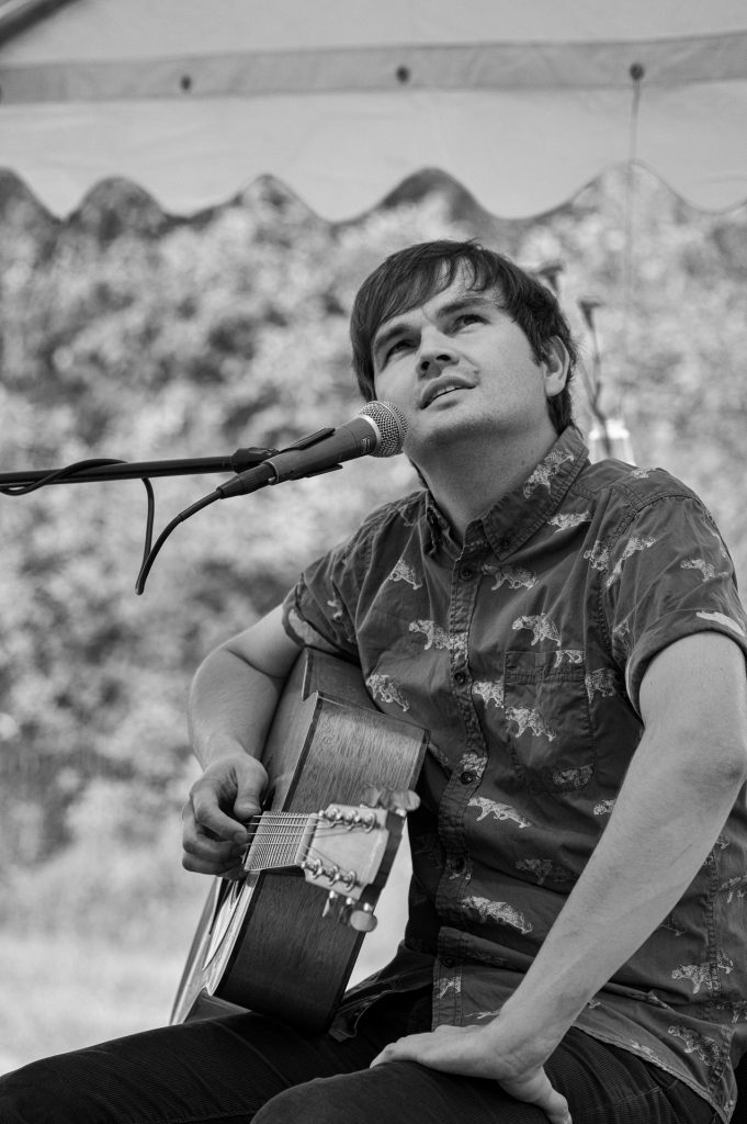 Vaiko Eplik with a guitar
